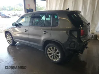 2014 Volkswagen Tiguan SEL with VIN WVGBV3AX2EW541476, listed as a Copart auction lot 64817795 with 158,032 mi miles and Salvage title. Bid and sale history available at DreamBid. Image 2.