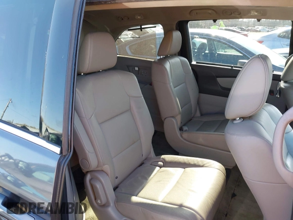 2015 Honda Odyssey Touring Elite z VIN 5FNRL5H9XFB067679, wystawiony jako IAAI lot #41913306 z przebiegiem 199 482 mil mil oraz . Historia ofert i sprzedaży dostępna na DreamBid. Obrazek 8.