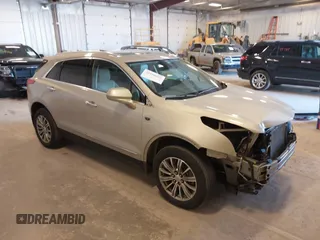 2017 Cadillac XT5 Luxury AWD z VIN 1GYKNDRS1HZ160606, wystawiony jako IAAI lot #41990425 z przebiegiem 130 822 mil mil oraz . Historia ofert i sprzedaży dostępna na DreamBid. Obrazek 1.