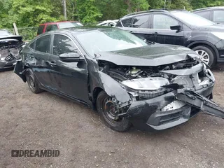 2017 Honda Civic LX z VIN 19XFC2F5XHE219941, wystawiony jako IAAI lot #42233664 z przebiegiem 132 341 mil mil oraz . Historia ofert i sprzedaży dostępna na DreamBid. Obrazek 1.
