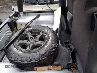 2004 Jeep Wrangler Sport with VIN 1J4FA49S64P767393, listed as a Copart auction lot 51662605 with 165,942 mi miles and Salvage Title. Bid and sale history available at carsss.com. Image 11.