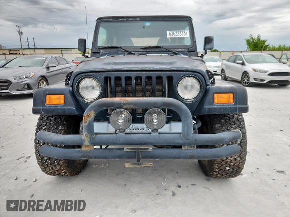 2000 Jeep Wrangler Sahara with VIN 1J4FA59S1YP777549, listed as a Copart auction lot 63622335 with 197,426 mi miles and Clean title. Bid and sale history available at DreamBid. Image 5.