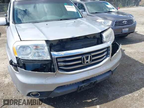 2013 Honda Pilot EX-L with VIN 5FNYF4H71DB041562, listed as a IAAI auction lot 41819184 with 136,014 mi miles and . Bid and sale history available at DreamBid. Image 6.