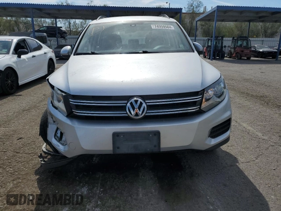 2017 Volkswagen Tiguan S with VIN WVGAV7AX1HK026998, listed as a Copart auction lot 74959504 with 93,696 mi miles and Salvage Title. Bid and sale history available at DreamBid. Image 5.