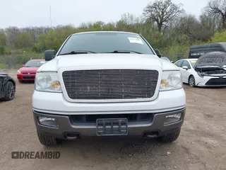 2005 Ford F-150 XLT with VIN 1FTPW14595FA87670, listed as a IAAI auction lot 42157009 with 291,713 mi miles. Bid and sale history available at carsss.com. Image 6.