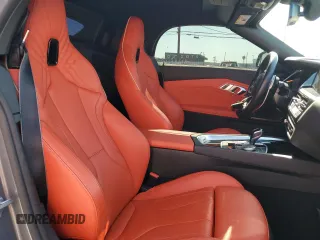 2024 BMW Z4 sDrive30i with VIN WBAHF3C06RWY36286, listed as a Copart auction lot 50296565 with 9,898 mi miles and Salvage title. Bid and sale history available at DreamBid. Image 10.