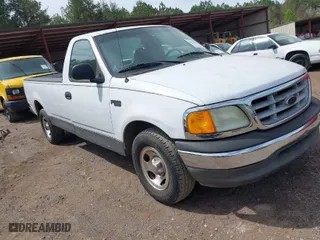 2004 Ford F-150 Heritage XL with VIN 2FTRF17294CA30311, listed as a IAAI auction lot 41874920 with 1 mi miles. Bid and sale history available at carsss.com. Image 1.
