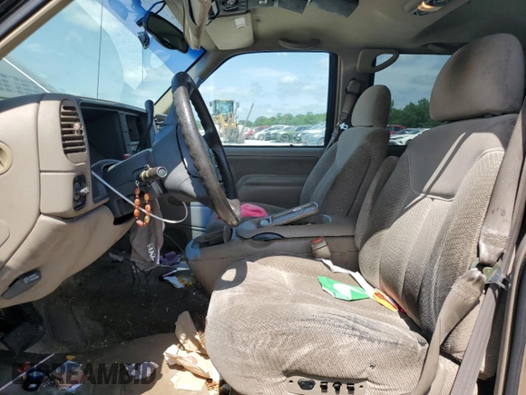 1999 Chevrolet Suburban with VIN 3GNEC16R6XG205408, listed as a Copart auction lot 57169415 with 303,412 mi miles and Salvage title. Bid and sale history available at DreamBid. Image 7.