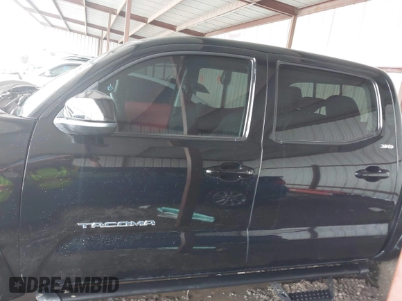 2023 Toyota Tacoma 4WD SR with VIN 3TMCZ5AN8PM538298, listed as a IAAI auction lot 41472145 with 66,484 mi miles. Bid and sale history available at carsss.com. Image 14.