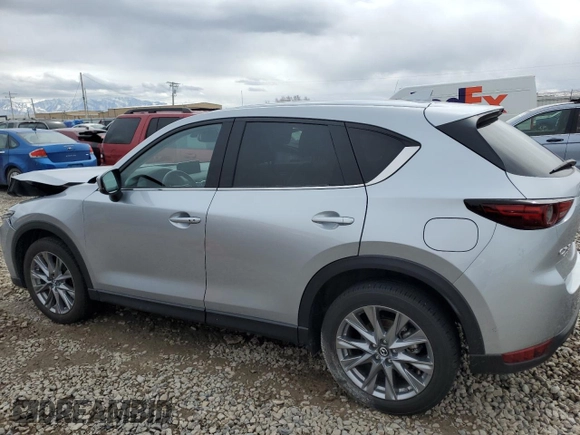 2021 Mazda CX-5 Grand Touring with VIN JM3KFBDM1M1403699, listed as a Copart auction lot 49888655 with 29,919 mi miles and Salvage Title. Bid and sale history available at carsss.com. Image 2.
