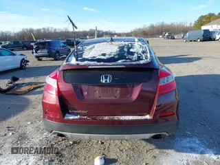 2013 Honda Crosstour EX z VIN 5J6TF3H33DL000648, wystawiony jako IAAI lot #41304910 z przebiegiem 147 670 mil mil oraz . Historia ofert i sprzedaży dostępna na DreamBid. Obrazek 16.