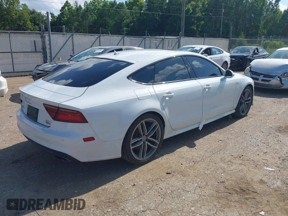 2016 Audi A7 Premium Plus with VIN WAUWGAFC2GN021696, listed as a IAAI auction lot 42595234 with 112,464 mi miles and . Bid and sale history available at DreamBid. Image 4.