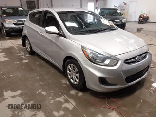 2013 Hyundai Accent GS with VIN KMHCT5AE4DU121779, listed as a IAAI auction lot 41250935 with 152,128 mi miles and . Bid and sale history available at DreamBid. Image 1.