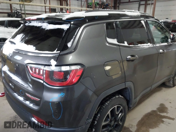 2019 Jeep Compass Trailhawk with VIN 3C4NJDDB2KT649889, listed as a IAAI auction lot 41562599 with 70,700 mi miles and . Bid and sale history available at carsss.com. Image 4.