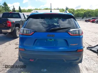 2020 Jeep Cherokee Trailhawk with VIN 1C4PJMBXXLD636547, listed as a IAAI auction lot 42314654 with 59,061 mi miles and . Bid and sale history available at DreamBid. Image 16.