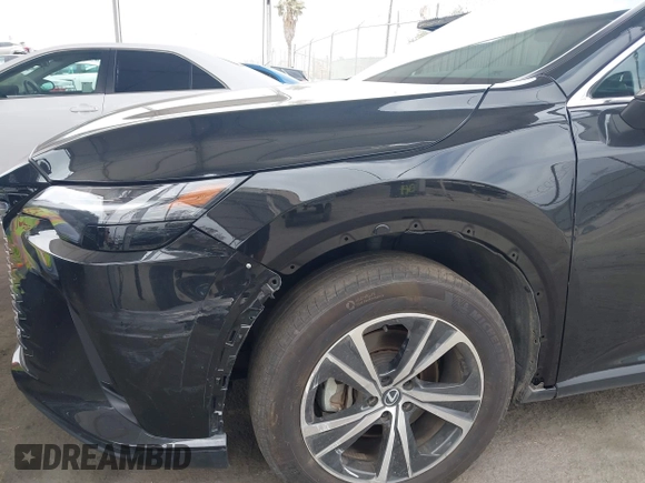 2023 Lexus RX 350 with VIN 2T2BAMBAXPC021856, listed as a IAAI auction lot 42790798 with 36,438 mi miles and . Bid and sale history available at DreamBid. Image 17.