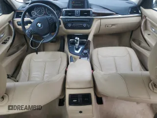 2013 BMW 3 Series 320i xDrive with VIN WBA3C3C57DF980971, listed as a Copart auction lot 57441155 with 131,263 mi miles and Salvage title. Bid and sale history available at DreamBid. Image 8.