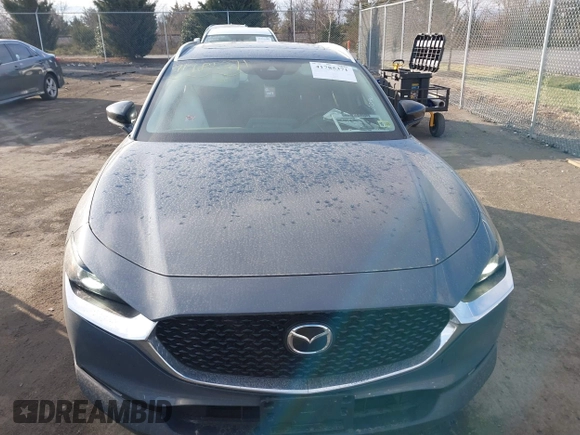 2023 Mazda CX-30 S Carbon Edition with VIN 3MVDMBCM1PM573317, listed as a IAAI auction lot 41785371 with 6,475 mi miles and . Bid and sale history available at DreamBid. Image 12.