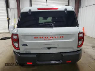 2022 Ford Bronco Sport Big Bend z VIN 3FMCR9B62NRE31886, wystawiony jako Copart lot #58951305 z przebiegiem 25 324 mil mil oraz Szkoda całkowita • Salvage title. Historia ofert i sprzedaży dostępna na DreamBid. Obrazek 6.