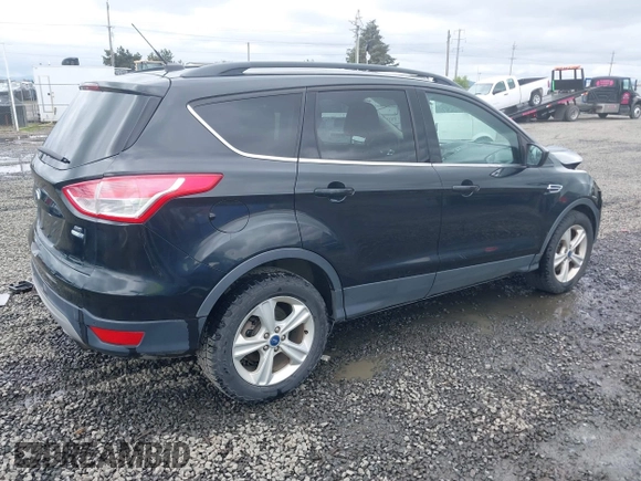 2015 Ford Escape SE with VIN 1FMCU9G98FUA26059, listed as a IAAI auction lot 41991222 with 149,298 mi miles and . Bid and sale history available at DreamBid. Image 4.