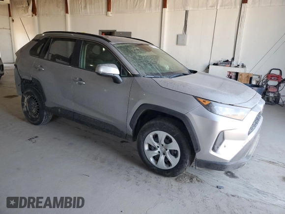 2019 Toyota RAV4 LE with VIN JTMG1RFV2KJ021318, listed as a Copart auction lot 46107385 with 57,863 mi miles and Salvage title. Bid and sale history available at DreamBid. Image 4.