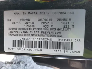2013 Mazda 3 i SV with VIN JM1BL1TF5D1782348, listed as a IAAI auction lot 42037608 with 96,222 mi miles and . Bid and sale history available at DreamBid. Image 9.