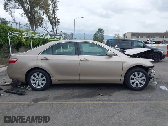 2009 Toyota Camry with VIN 4T4BE46K19R092530, listed as a IAAI auction lot 42051158 with 135,875 mi miles. Bid and sale history available at carsss.com. Image 14.