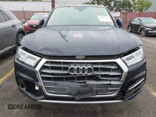 2019 Audi Q5 Premium Plus z VIN WA1BNAFY5K2049080, wystawiony jako IAAI lot #42057631 z przebiegiem 94 767 mil mil oraz . Historia ofert i sprzedaży dostępna na DreamBid. Obrazek 6.