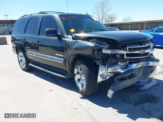 2003 Chevrolet Tahoe LS with VIN 1GNEC13T23R250680, listed as a IAAI auction lot 41860092 with 216,675 mi miles. Bid and sale history available at carsss.com. Image 1.
