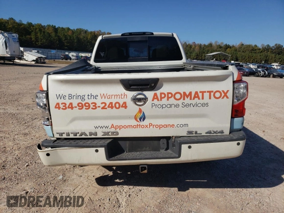 2019 Nissan Titan XD SL with VIN 1N6BA1F43KN511419, listed as a Copart auction lot 77875274 with 27,447 mi miles and Salvage Title. Bid and sale history available at carsss.com. Image 6.