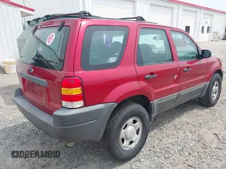 2003 Ford Escape XLS Popular with VIN 1FMYU02173KB35039, listed as a IAAI auction lot 42027491 with 208,808 mi miles and . Bid and sale history available at DreamBid. Image 4.