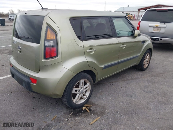 2011 Kia Soul + with VIN KNDJT2A25B7235950, listed as a IAAI auction lot 41378923 with 191,116 mi miles. Bid and sale history available at carsss.com. Image 4.