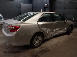 2013 Toyota Camry L with VIN 4T1BF1FK3DU716634, listed as a IAAI auction lot 41759908 with 118,955 mi miles. Bid and sale history available at carsss.com. Image 4.