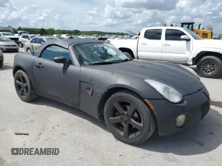 2006 Pontiac Solstice z VIN 1G2MB33BX6Y104410, wystawiony jako Copart lot #70671814 z przebiegiem 123 508 mil mil oraz Czysty tytuł • Clean title. Historia ofert i sprzedaży dostępna na DreamBid. Obrazek 4.