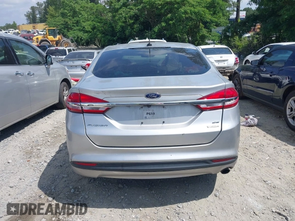 2017 Ford Fusion SE z VIN 3FA6P0HDXHR238713, wystawiony jako IAAI lot #42304140 z przebiegiem 157 630 mil mil oraz . Historia ofert i sprzedaży dostępna na DreamBid. Obrazek 16.