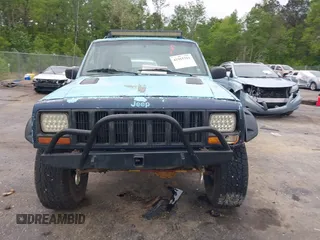 1997 Jeep Cherokee SE z VIN 1J4FJ28S3VL573144, wystawiony jako IAAI lot #41965201 z przebiegiem 298 276 mil mil oraz . Historia ofert i sprzedaży dostępna na DreamBid. Obrazek 12.