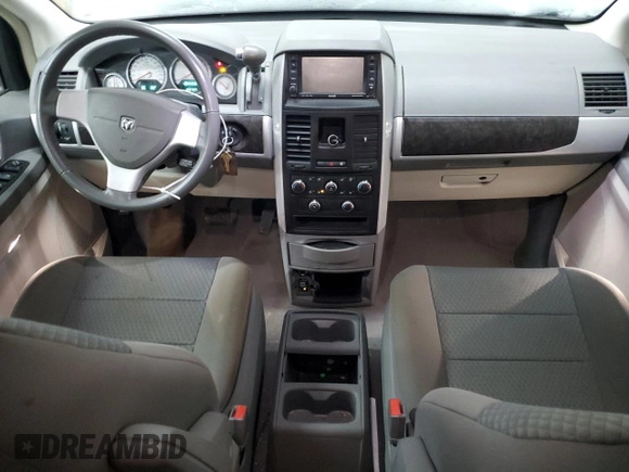 2010 Dodge Grand Caravan Crew with VIN 2D4RN6DX9AR390514, listed as a Copart auction lot 50906305 with 102,729 mi miles and Clean Title. Bid and sale history available at DreamBid. Image 8.