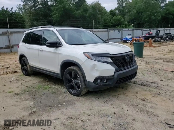 2019 Honda Passport Elite with VIN 5FNYF8H00KB005305, listed as a Copart auction lot 63369345 with 49,267 mi miles and Salvage title. Bid and sale history available at DreamBid. Image 14.