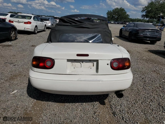 1991 Mazda MX-5 Miata Special Edition with VIN JM1NA3516M1216635, listed as a Copart auction lot 73003054 with 142,383 mi miles and Non Repairable. Bid and sale history available at carsss.com. Image 6.