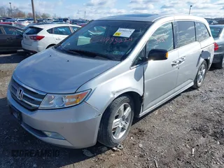 2011 Honda Odyssey Touring with VIN 5FNRL5H92BB049901, listed as a IAAI auction lot 41985224 with 101,957 mi miles and . Bid and sale history available at DreamBid. Image 17.