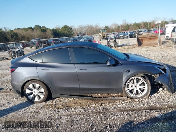 2022 Tesla Model Y Long Range with VIN 7SAYGAEE6NF361883, listed as a IAAI auction lot 41752441 with 50,493 mi miles and . Bid and sale history available at DreamBid. Image 13.