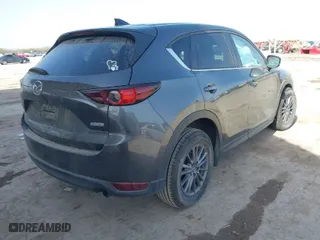 2019 Mazda CX-5 Touring with VIN JM3KFACMXK0686957, listed as a IAAI auction lot 41720338 with 95,421 mi miles. Bid and sale history available at carsss.com. Image 4.