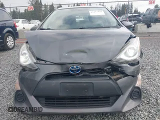 2015 Toyota Prius One z VIN JTDKDTB32F1575905, wystawiony jako IAAI lot #42152447 z przebiegiem 141 061 mil mil oraz . Historia ofert i sprzedaży dostępna na DreamBid. Obrazek 6.