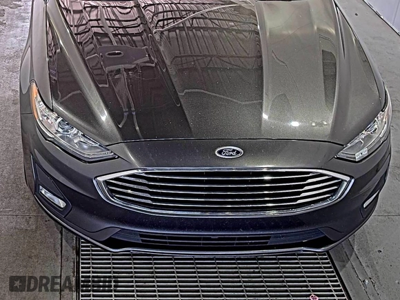 2020 Ford Fusion SE z VIN 3FA6P0HD6LR189762, wystawiony jako IAAI lot #42780149 z przebiegiem 51 099 mil mil oraz . Historia ofert i sprzedaży dostępna na DreamBid. Obrazek 15.