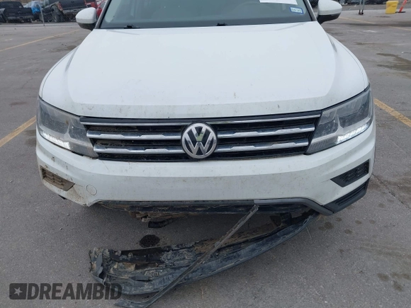 2020 Volkswagen Tiguan S with VIN 3VV1B7AX5LM079123, listed as a IAAI auction lot 41957273 with 89,449 mi miles and . Bid and sale history available at DreamBid. Image 6.