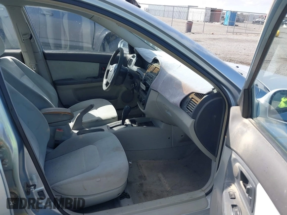 2004 Kia Spectra LX with VIN KNAFE122645052206, listed as a IAAI auction lot 41767864 with 63,866 mi miles. Bid and sale history available at carsss.com. Image 5.