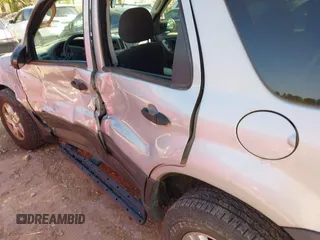 2003 Ford Escape XLT Popular 2 with VIN 1FMYU93183KD62338, listed as a IAAI auction lot 41990799 with 216,952 mi miles and . Bid and sale history available at DreamBid. Image 6.