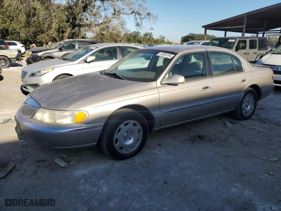 2000 Lincoln Continental with VIN 1LNHM97V4YY832947, listed as a Copart auction lot 83350184 with 164,389 mi miles and Salvage Title. Bid and sale history available at carsss.com. Image 1.