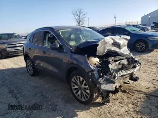 2021 Ford Escape Titanium with VIN 1FMCU9J90MUB16909, listed as a Copart auction lot 42547724 with 24,300 mi miles and Salvage Title. Bid and sale history available at carsss.com. Image 4.