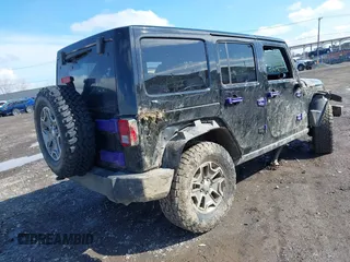 2018 Jeep Wrangler Unlimited Rubicon Recon with VIN 1C4HJWFG1JL915740, listed as a IAAI auction lot 41965305 with 73,035 mi miles and . Bid and sale history available at DreamBid. Image 4.